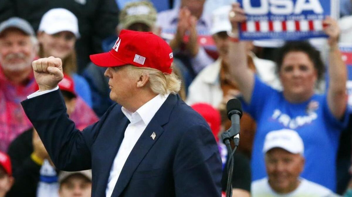 President-elect Donald Trump cheers on the crowd during his speech at a rally Dec. 17 in Mobile, Ala.
