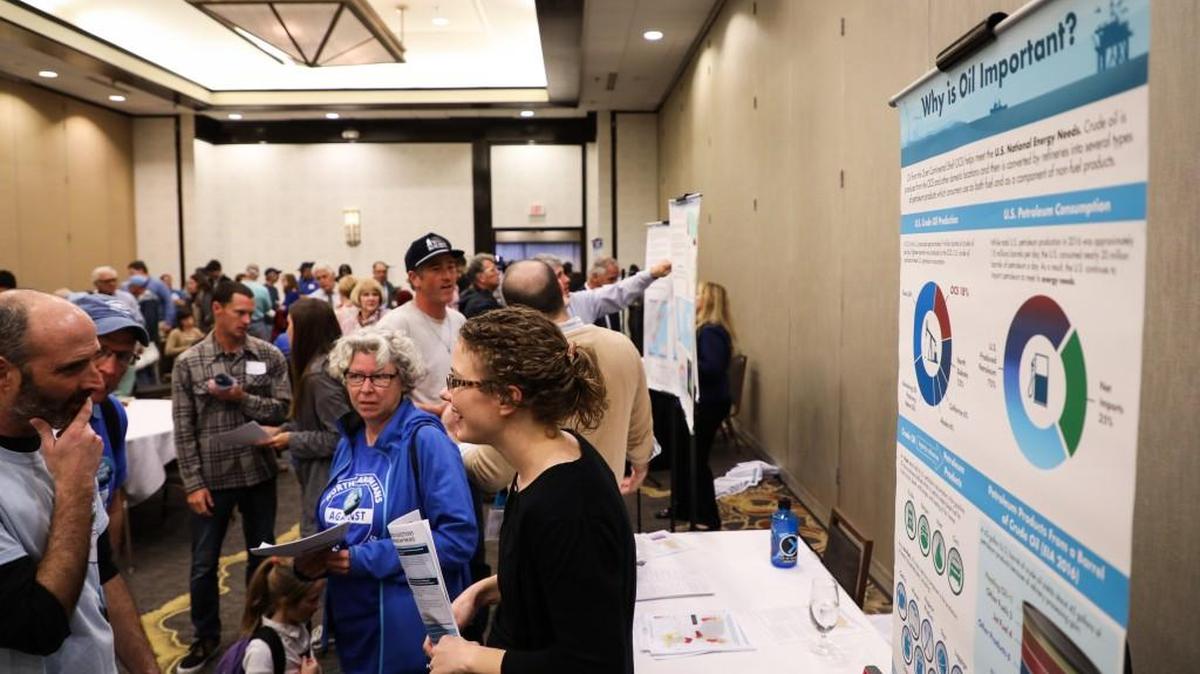 Booths with detailed information about several factors used to consider offshore drilling were set up in a ballroom at the Hilton North Raleigh Midtown Hotel by the Bureau of Ocean Energy Management on February 26, 2018.