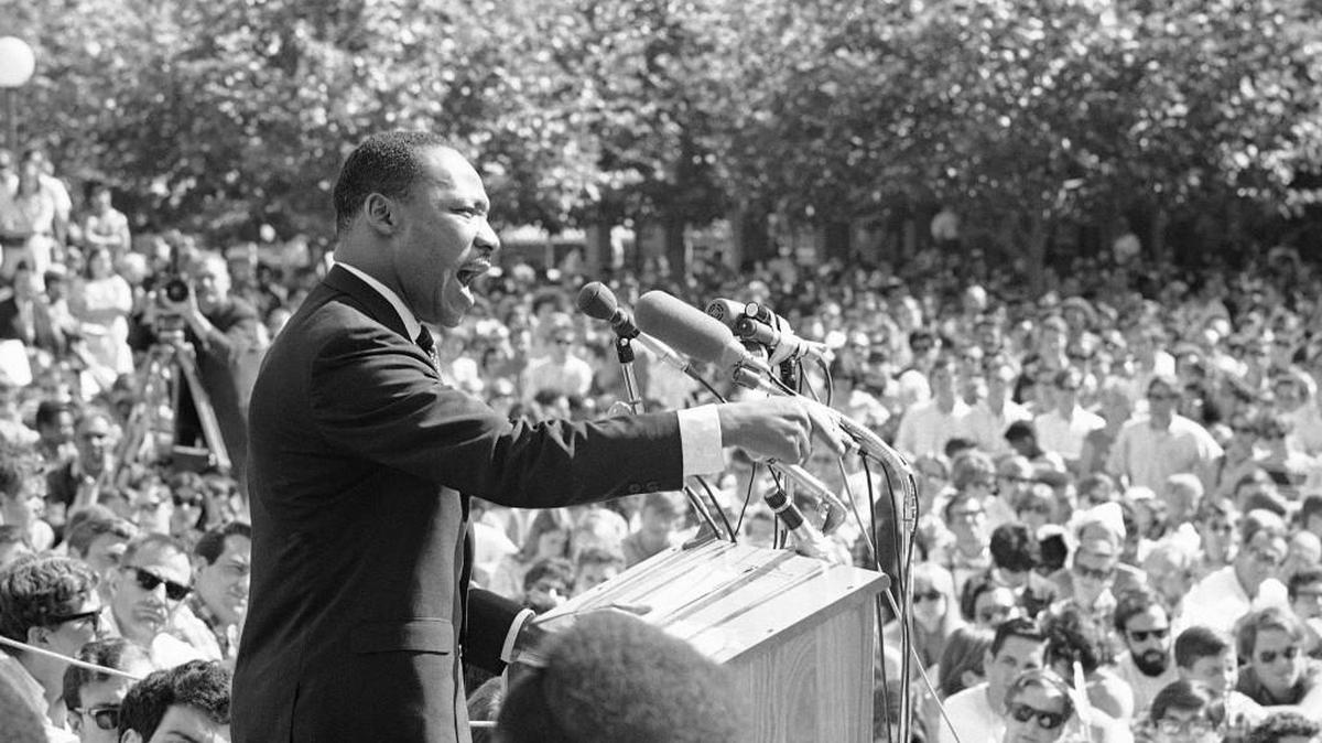 FILE - In this May 17, 1967 file photo, Dr. Martin Luther King speaks at the University of California administration building in Berkeley, Calif. Fifty years ago, Martin Luther King Jr. asked Americans, "Where do we go from here?" His warning of chaos or community squarely confronted racism, and marked a shift from his emphasis on nonviolence to a demand for full economic and political equality. Younger generations of black activists say they prefer the pointed, more forceful King to the Nobel Peace Prize-winning pacifist who preached love over hate. (AP Photo, File)