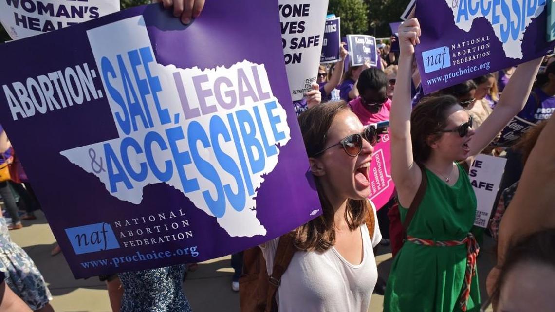 Abortion rights activists chant outside of the US Supreme Court ahead of a ruling on abortion clinic restrictions.