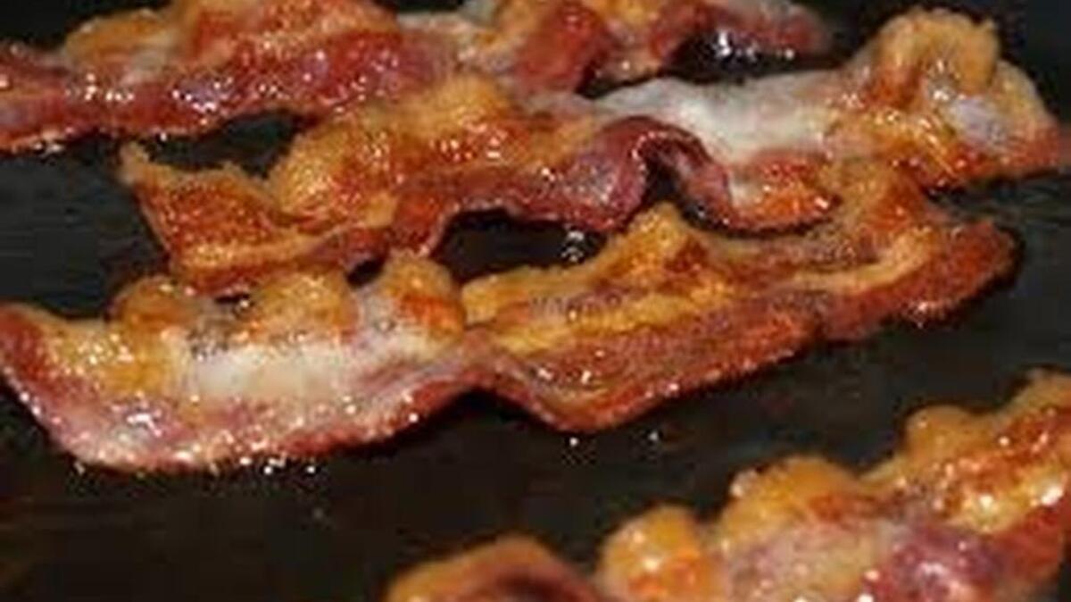 The World Health Organization says bacon and other processed meats are carcinogens.