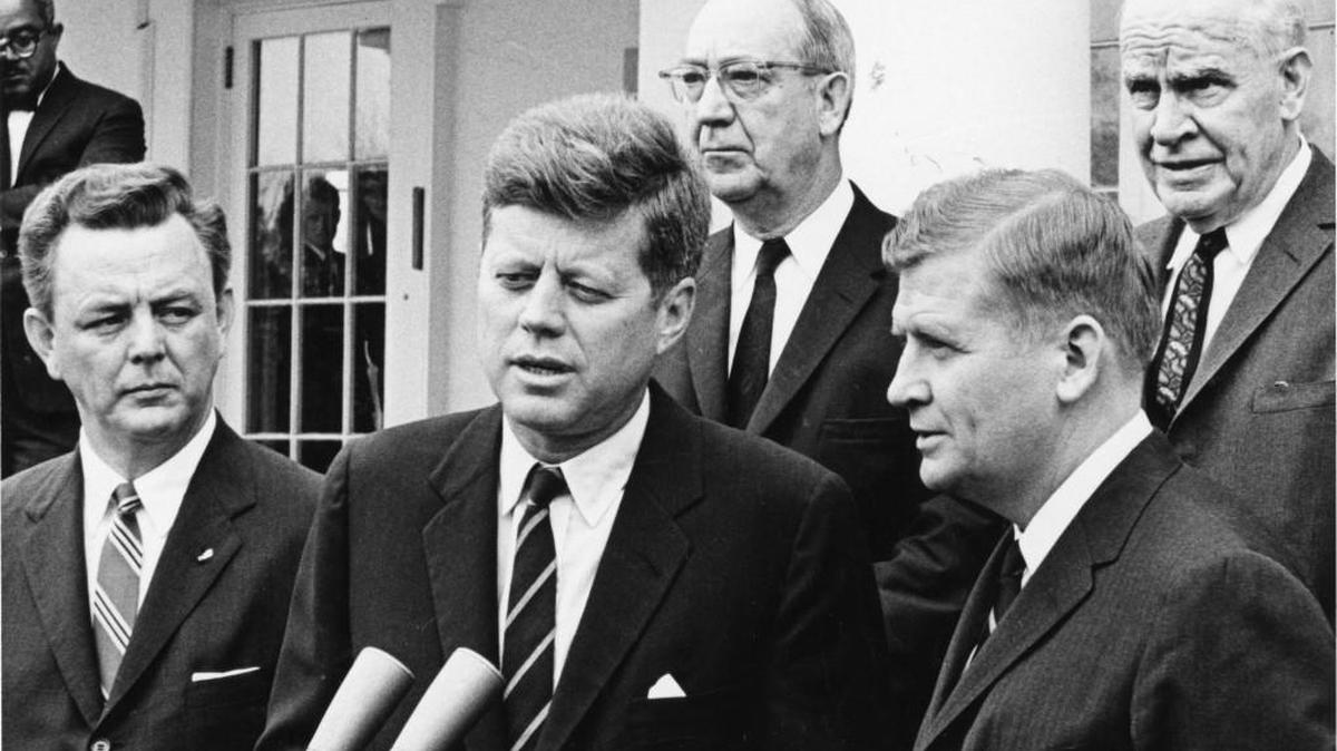 President John F. Kennedy (center) and Governor Terry Sanford (front, right) at a meeting at the White House April 28, 1961. At left is Skpper Bowles. At rear from left are Senator Everett Jordan and Commerce Secretary Luther Hodges.