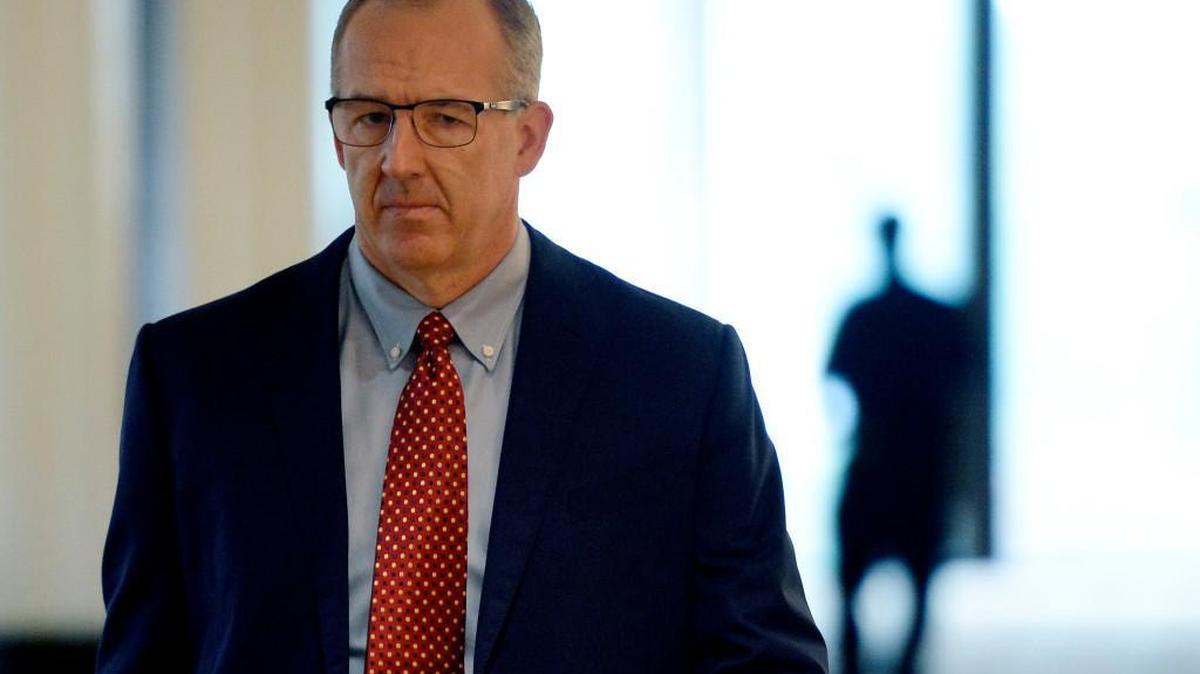 FILE - In this Aug. 16, 2017, file photo, Southeastern Conference Commissioner Greg Sankey, head of the NCAA infraction panel handling North Carolina's ongoing academic case, arrives at an NCAA hearing in Nashville, Tenn. Sankey says it's "more likely than not" that UNC athletes received fraudulent credit, but the organization's bylaws leave it to the schools themselves to determine academic fraud. He added that the panel could not use "those strong possibilities" to determine whether violations occurred."