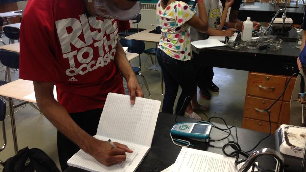 ENC STEM students work in a lab as part of summer program to help students in low-income NC districts learn advanced science and math.