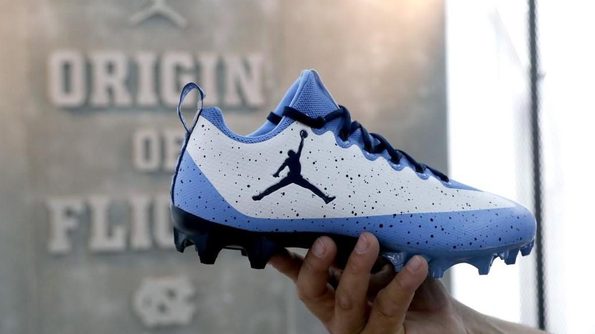 The UNC football unveiled their redesigned uniforms at the Meet the Heels event on Franklin St. in Chapel Hill on Aug. 5, 2017. The uniforms feature Nike’s Michael Jordan “Jumpman” logo on the jersey and shoes.