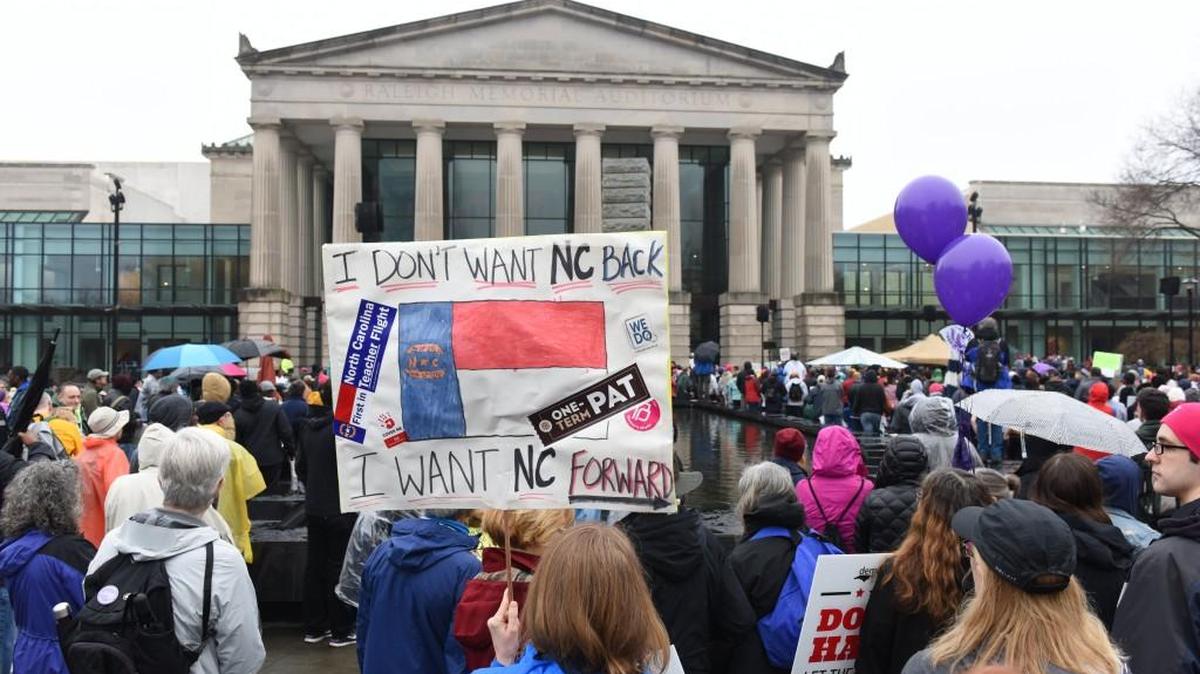 Participants gather and listen to speakers before the Moral March on Raleigh in Raleigh, N.C. on Saturday, February 10, 2017. The theme of this year's march and rally was "Taking resistance to the ballot box." Speakers talked about the importance of voting and the dangers of gerrymandering among other topics.