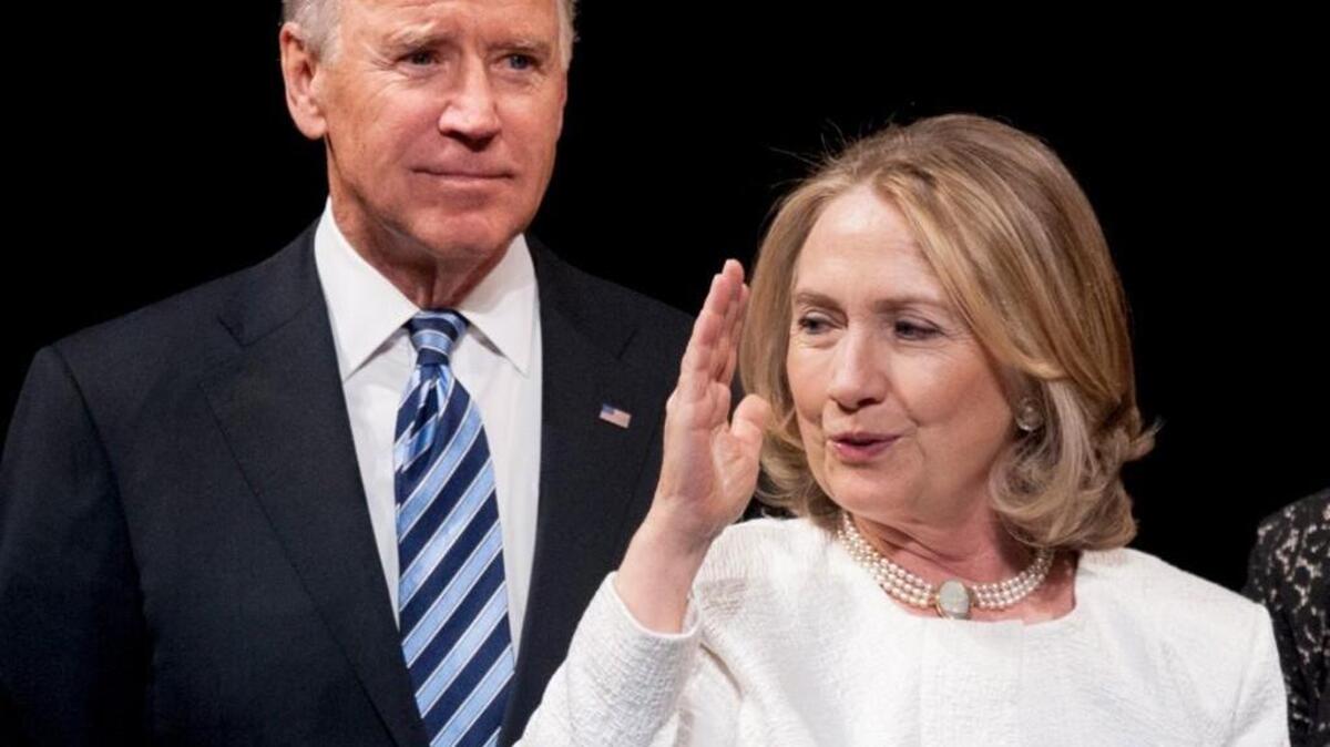 
Vice President Joe Biden and former Secretary of State Hillary Rodham Clinton appear onstage at the Kennedy Center for the Performing Arts in Washington in April 2013. 
