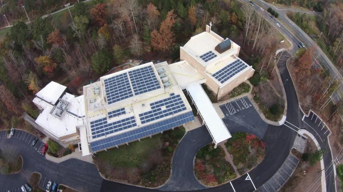 A GOD’S EYE VIEW: An array of 326 solar panels have transformeed the roof of United Church of Chapel Hill.