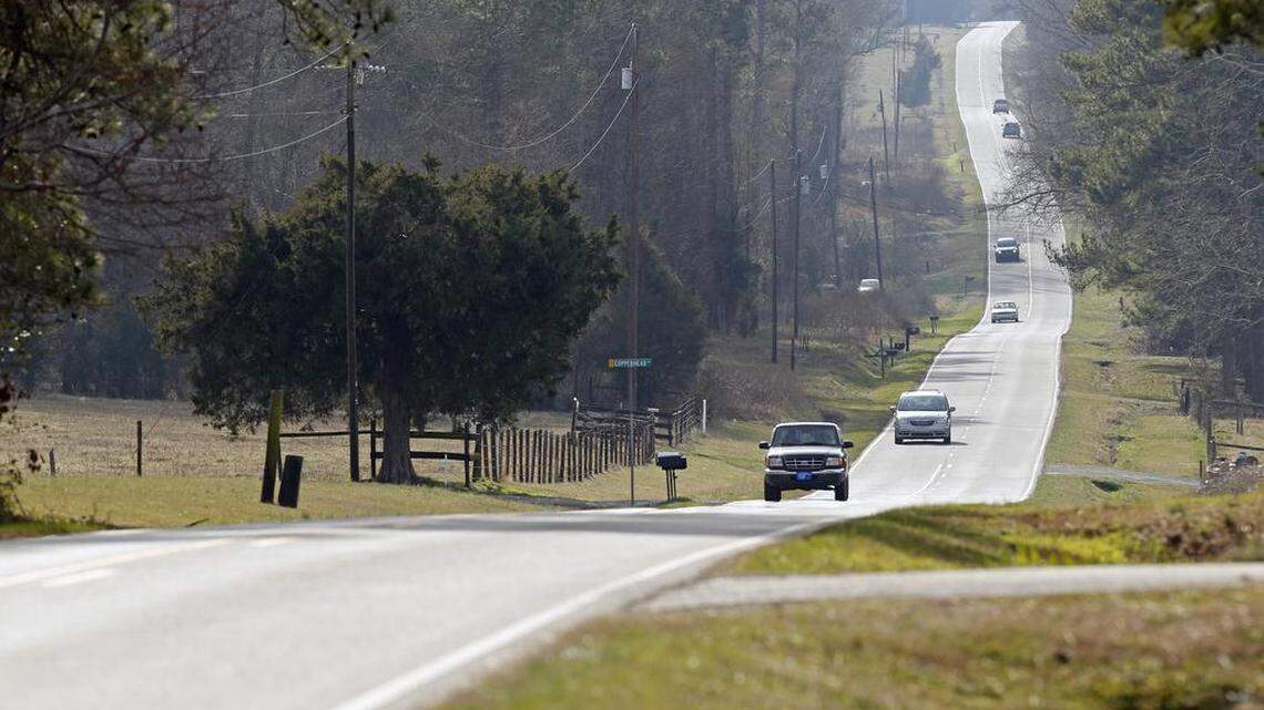 Vehicles travel on Silk Hope Rd. northeast of Siler City. As the county sees a shift from being mostly rural to being split between urban/suburban and rural, it will have to face issues how it wants to proceed with the influx and growth that is coming.