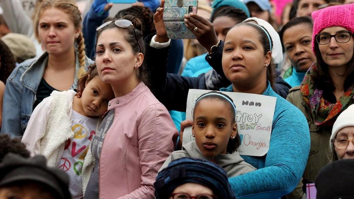 Participants listen to a speaker during the Women's March on Raleigh rally in downtown Raleigh on Saturday, Jan. 21, 2017.