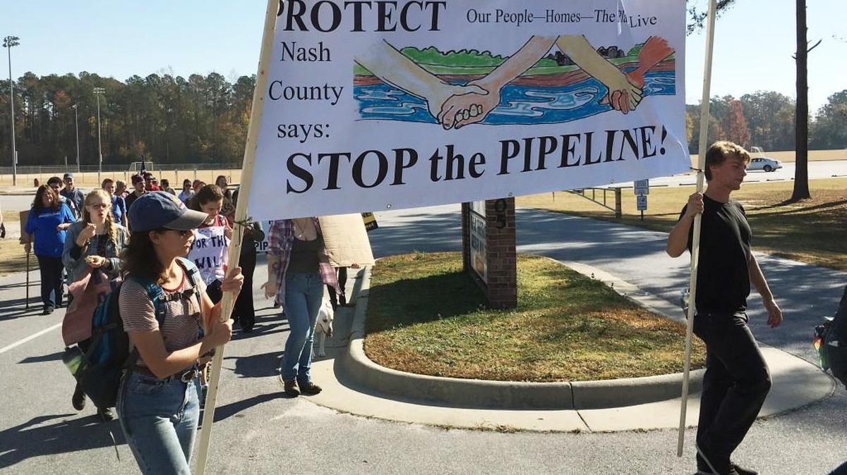 Nash County protestors oppose the Atlantic Coast Pipeline, which Dominion Power and Duke Energy want to build through Virginia and eastern North Carolina as they march on Nov. 19, 2016.