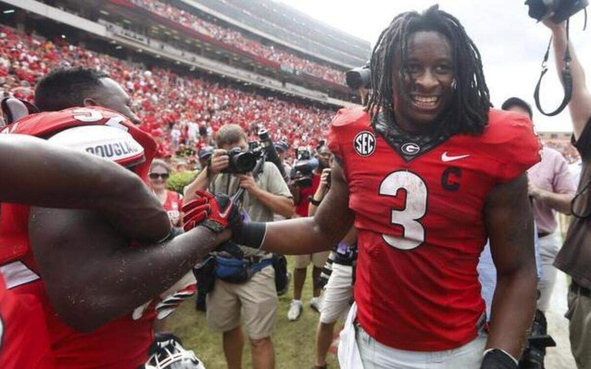 
Georgia running back Todd Gurley (3) will visit with the Carolina Panthers this week, according to reports. He suffered an ACL injury late in the 2014 season and is still recovering. 
