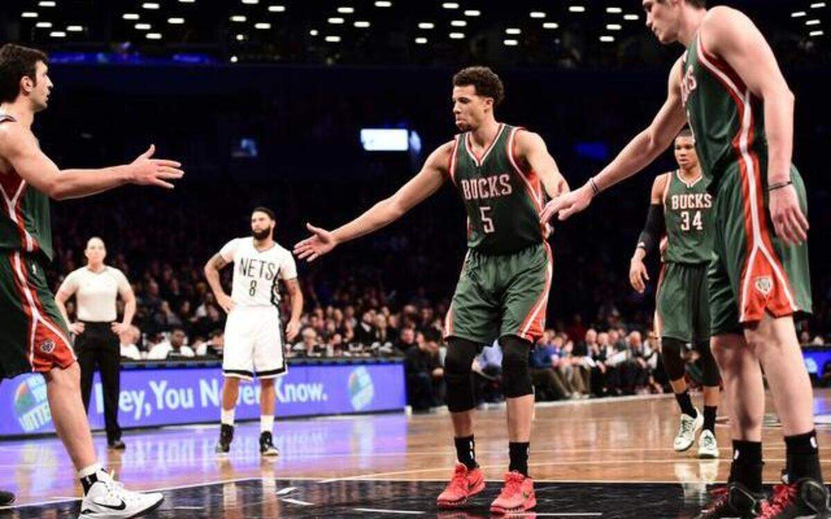 
Milwaukee Bucks guard Michael Carter-Williams (5) at the free-throw line during a regular season game against the Brooklyn Nets at the Barclays Center in New York, March 20, 2015. For most NBA players, teammates’ kudos are part of the routine at the free-throw line — regardless of the outcome. (Ben Solomon/The New York Times)

