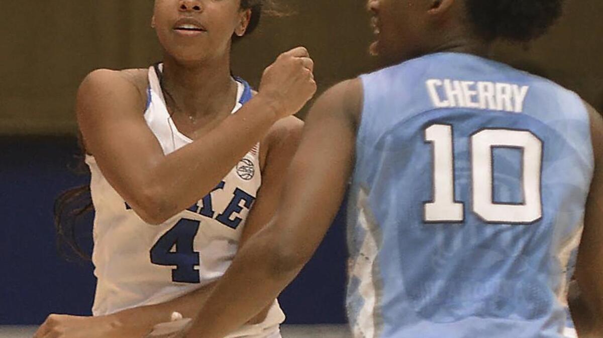Duke’s Lexie Brown, left, has been named one of 10 finalists for the Nancy Lieberman Award.