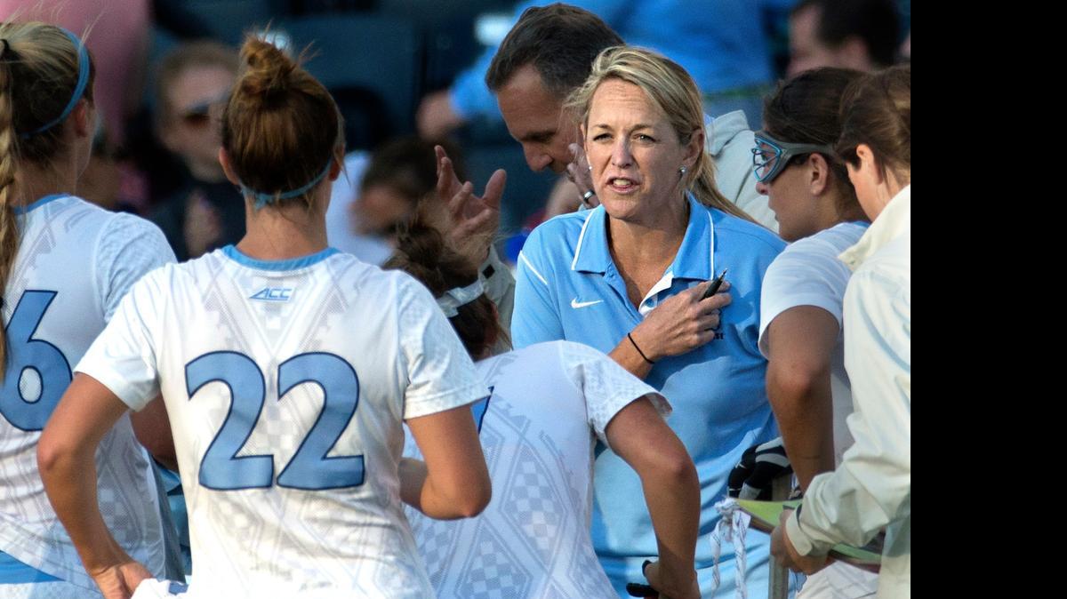 
North Carolina's head coach Jenny Levy talks things over with her team during the second half of the semifinals in the NCAA Division I women's lacrosse tournament againstDuke, Friday, May 22, 2015, in Chester, Pa. North Carolina won 16-7. 
