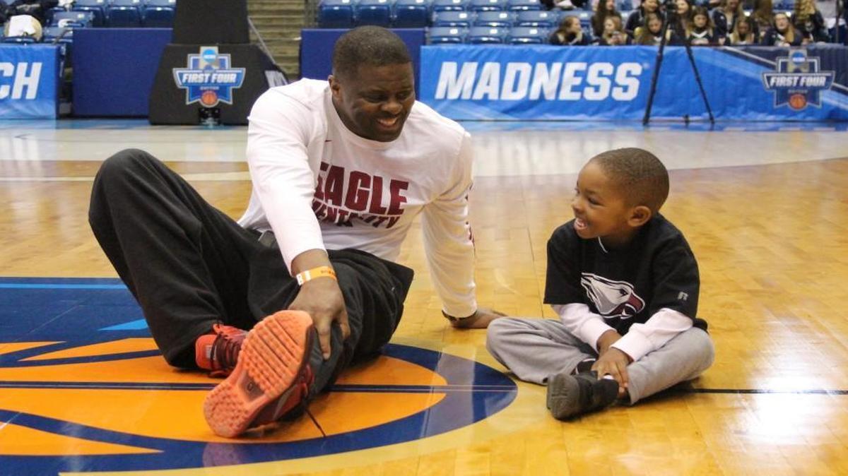 NCCU head coach LeVelle Moton hangs out on the court in Dayton with his son VJ, 4.