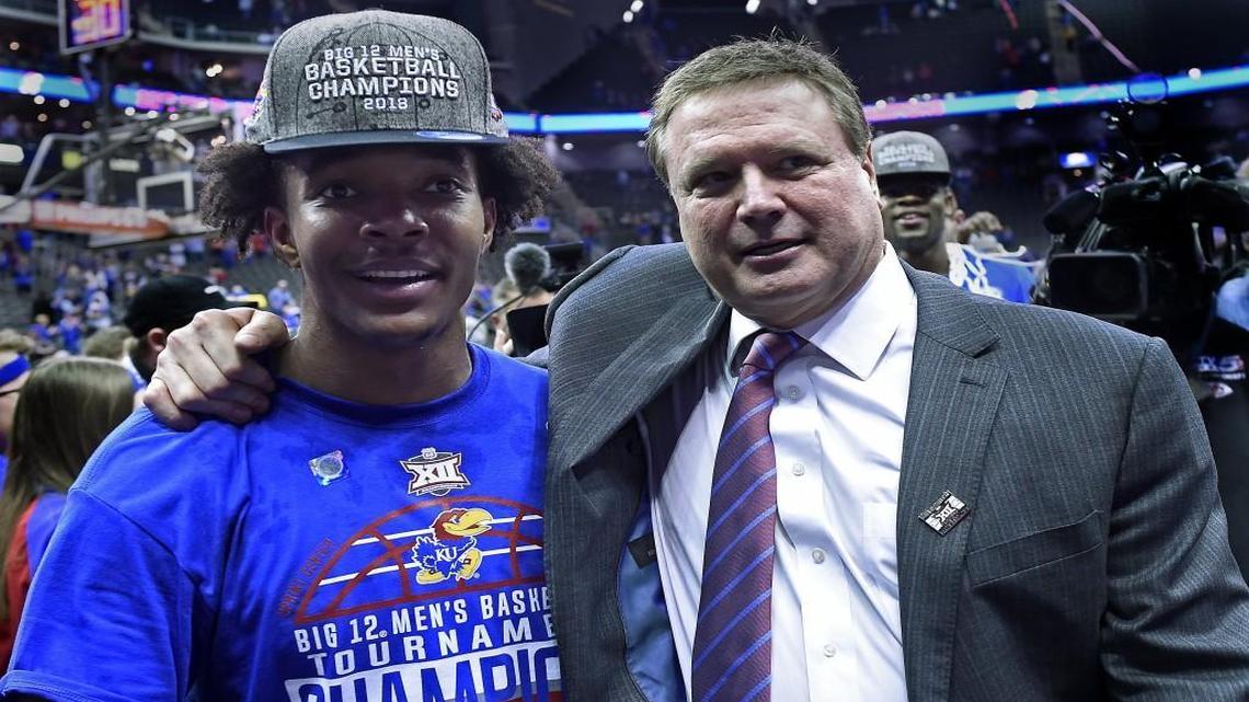 KU senior Devonte' Graham leaves the court with Kansas head coach Bill Self after the Jayhawks beat West Virginia, 81-70 and claimed the Big 12 Tournament championship Saturday night at the Sprint Center.