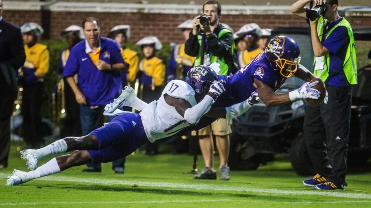 East Carolina’s Zay Jones dives into the end zone in the Pirates 52-7 win over Western Carolina Saturday in Greenville.