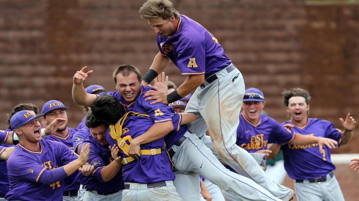 East Carolina players celebrate an 8-4 victory over William & Mary to win the NCAA Charlottesville Regional championship baseball game.