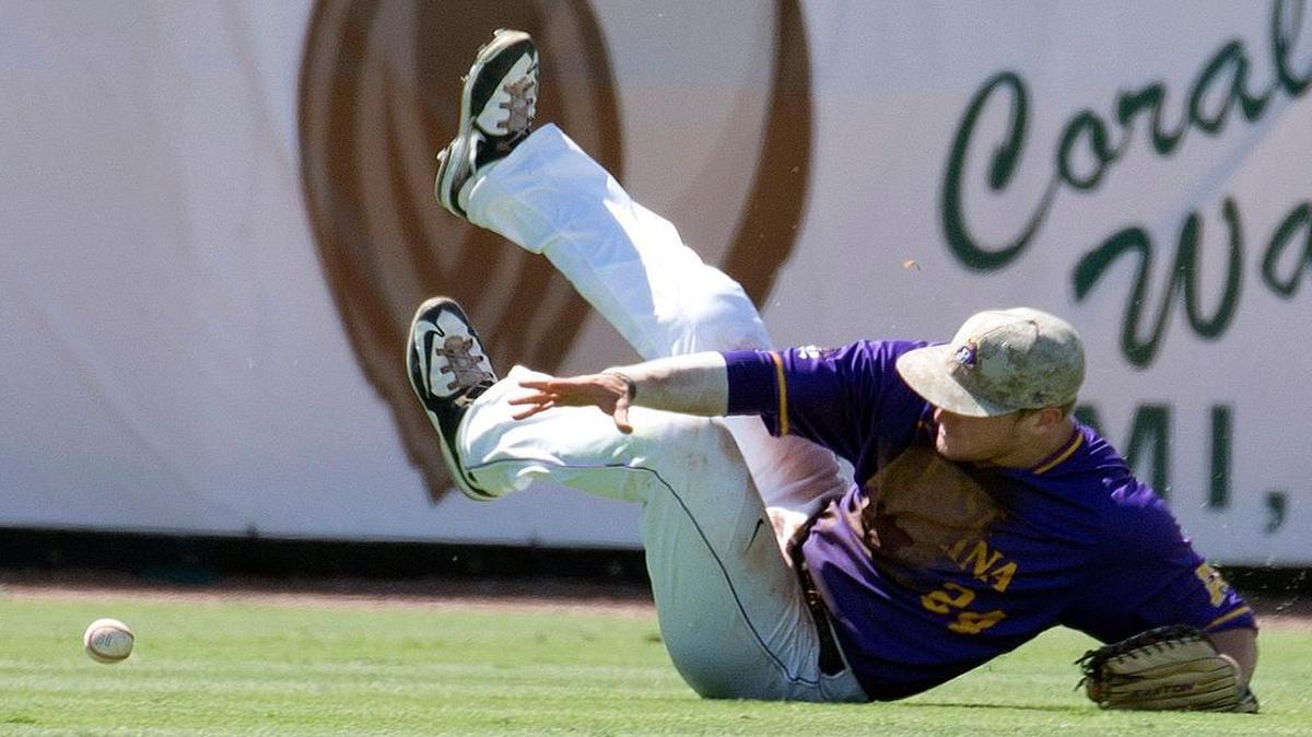 
East Carolina's Luke Lowery (24) misplays a ball hit by Columbia's Joey Falcone during the sixth inning of a Coral Gables Regional game of the NCAA college baseball tournament in Coral Gables, Fla., Friday, May 29, 2015. Columbia won 6-3. 
