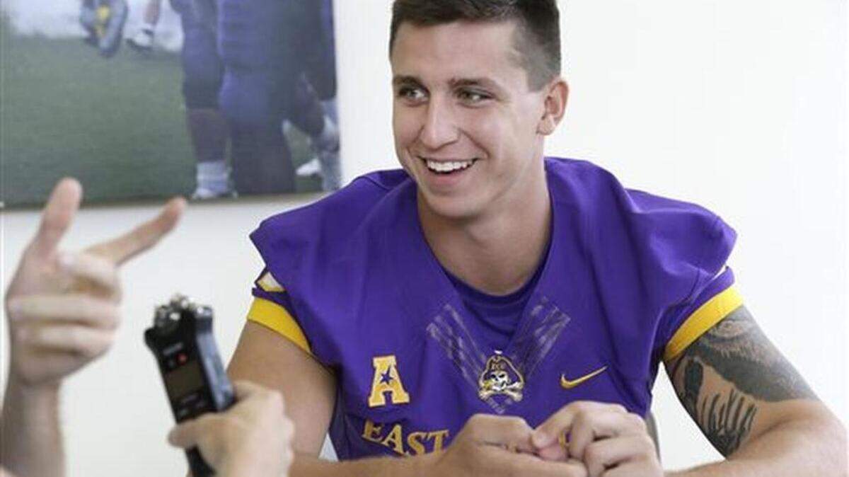 East Carolina quarterback Kurt Benkert responds to a question during the team's NCAA college football media day in Greenville, N.C., Saturday, Aug. 8, 2015.