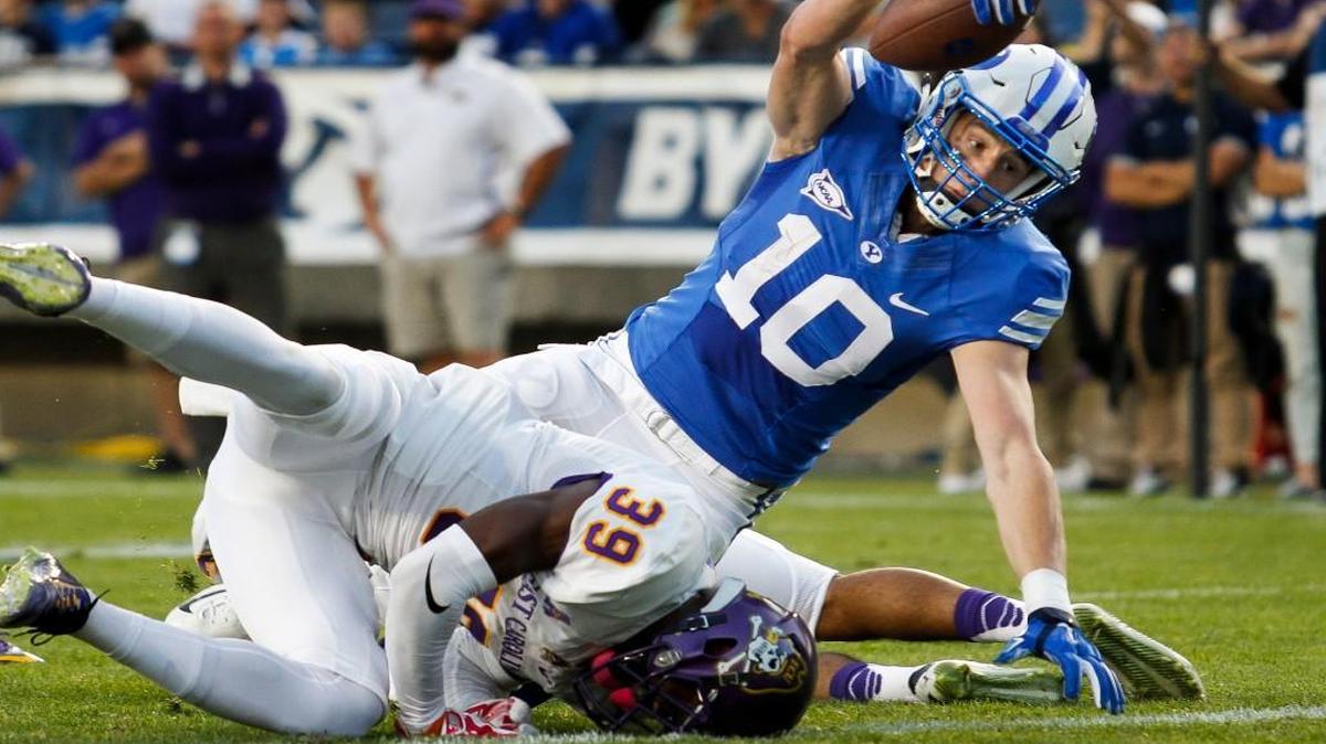 
BYU wide receiver Mitch Mathews (10) dives into the end zone for a touchdown against East Carolina during the first half in an NCAA college football game, Saturday, Oct. 10, 2015 in Provo, Utah.
