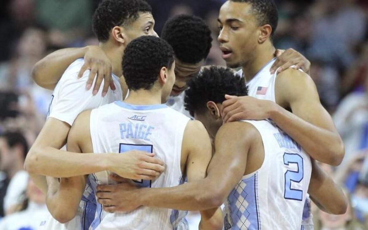 North Carolina's Justin Jackson, Kennedy Meeks, Brice Johnson, Joel Berry (2) and Marcus Paige (5) huddle before the start of the Tar Heels’ NCAA tournament run.