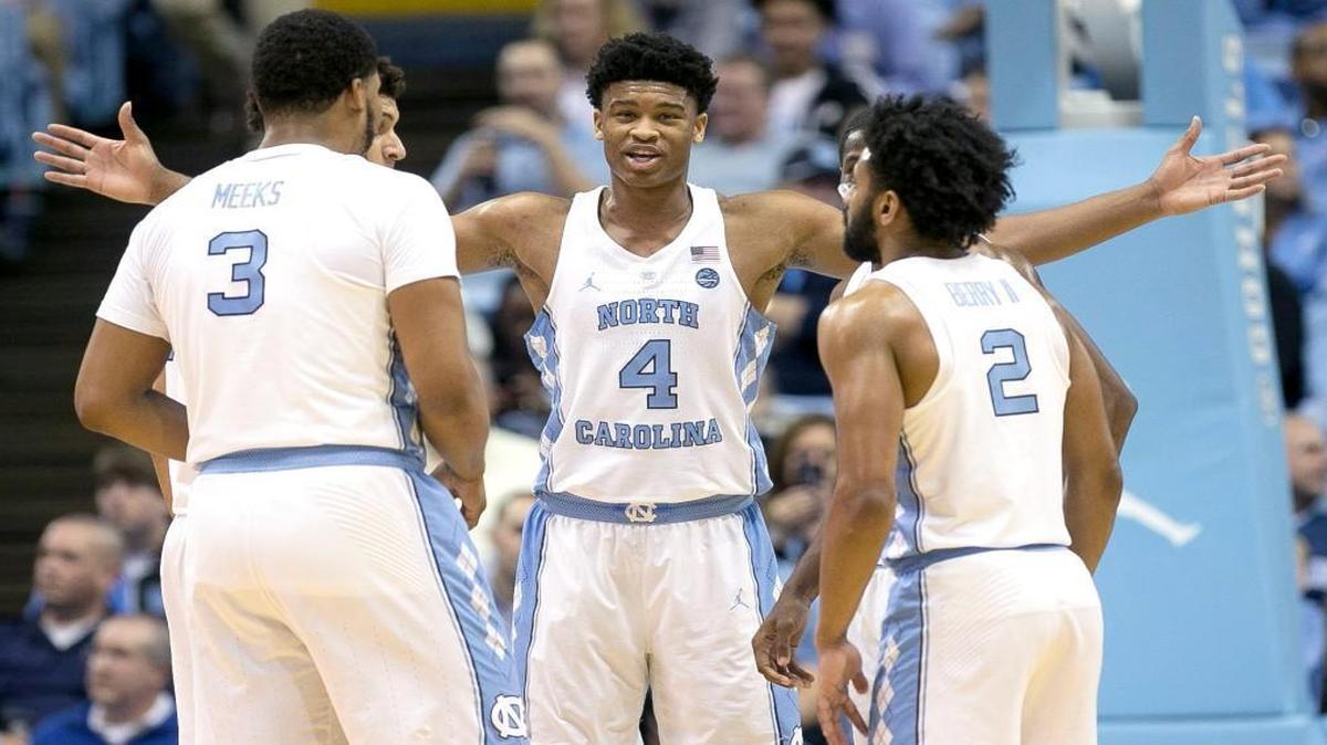 North Carolina’s Isaiah Hicks (4) huddles with teammates Kennedy Meeks and Joel Berry II during their 85-42 victory over Northern Iowa on Dec. 21 in Chapel Hill.