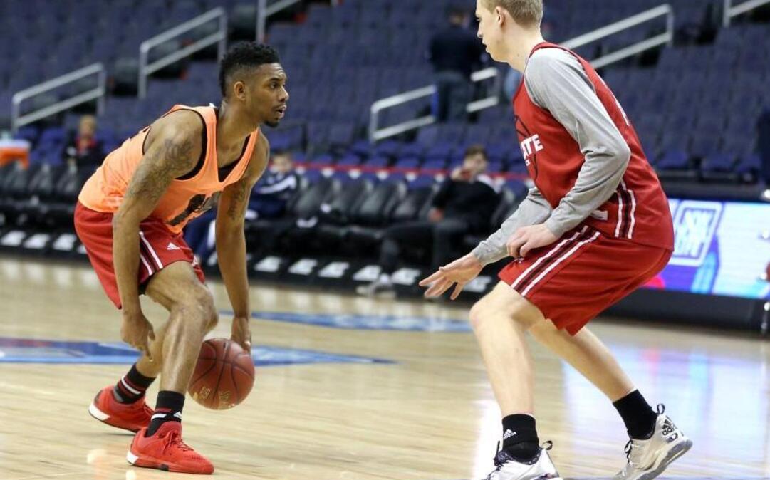 N.C. State's Terry Henderson (3), left, look to dribble around Maverick Rowan (24) during the Wolfpack's practice before the 2016 New York Life ACC Tournament at the Verizon Center in Washington, D.C., in March 7, 2016.