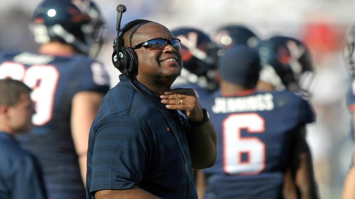 
Head coach Mike London of the Virginia Cavaliers watches the score board during their game again the Brigham Young Cougars at LaVell Edwards Stadium on September 20, 2014 in Provo, Utah. 
