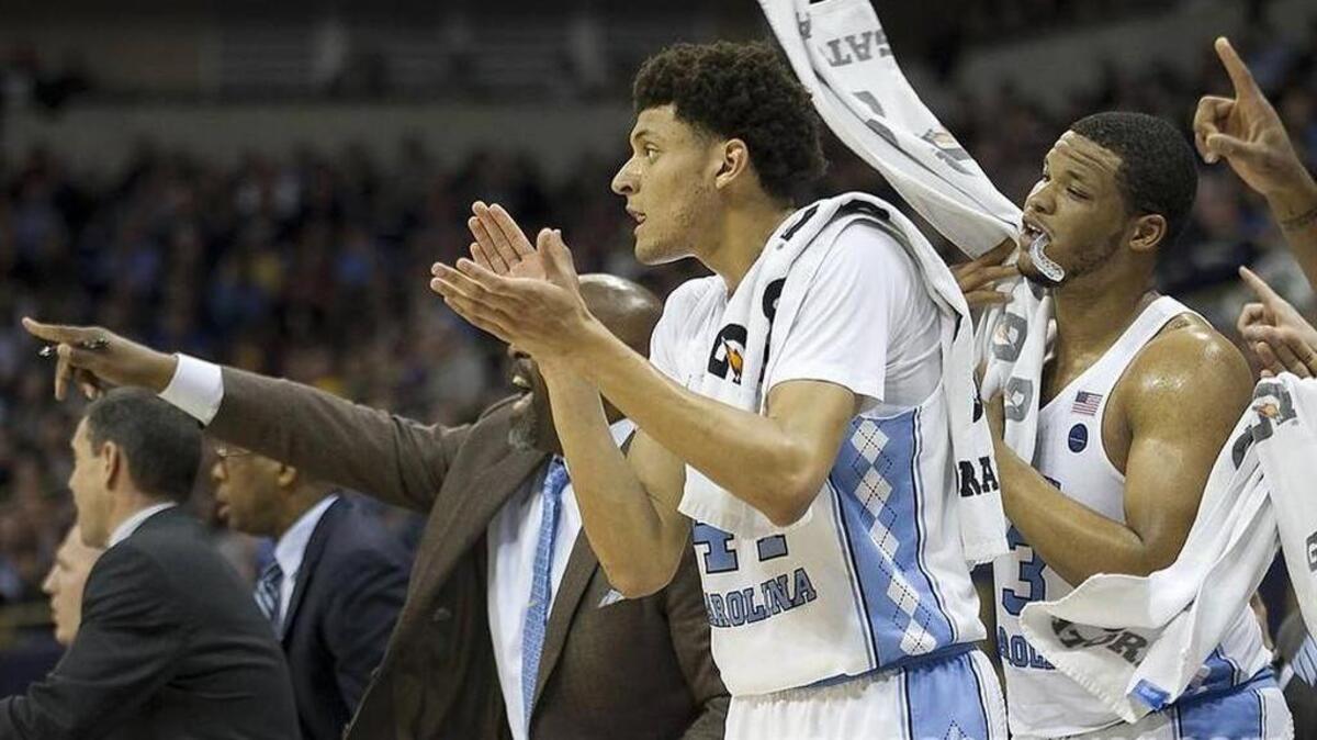 UNC junior forward Justin Jackson and his teammates cheer the release of the new ACC power rankings, which have the Tar Heels No. 1.