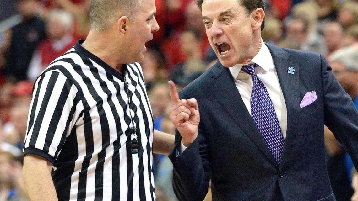 Louisville head coach Rick Pitino, right, argues with referee Brian Dorsey during the Cardinals game against Duke in 2016.