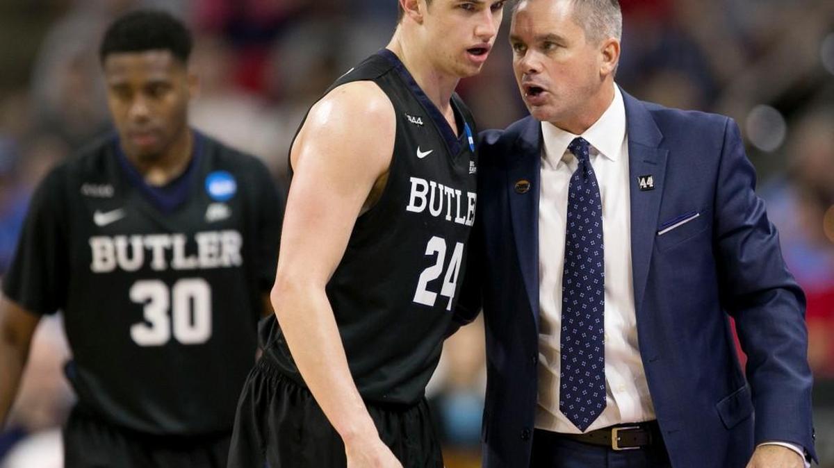 Butler coach Chris Holtmann confers with Kellen Dunham (24) during the second half of their first round NCAA Tournament game against Texas Tech on Thursday. Saturday night in Raleigh will be an ACC/Big East challenge of sorts with Butler playing Virginia and Providence facing UNC.