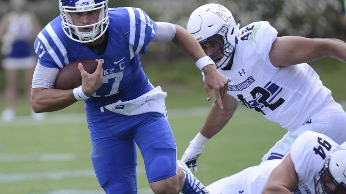 Duke quarterback Daniel Jones runs against Northwestern during an NCAA college football game, Saturday, Sept. 9, 2017, in Durham. (Bernard Thomas/The Herald-Sun via AP)