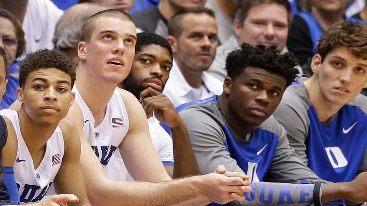 Duke’s Amile Jefferson, center, sits on the bench with an injured foot against Georgia Southern. Jefferson, who was averaging a double-double, is out indefinitely.