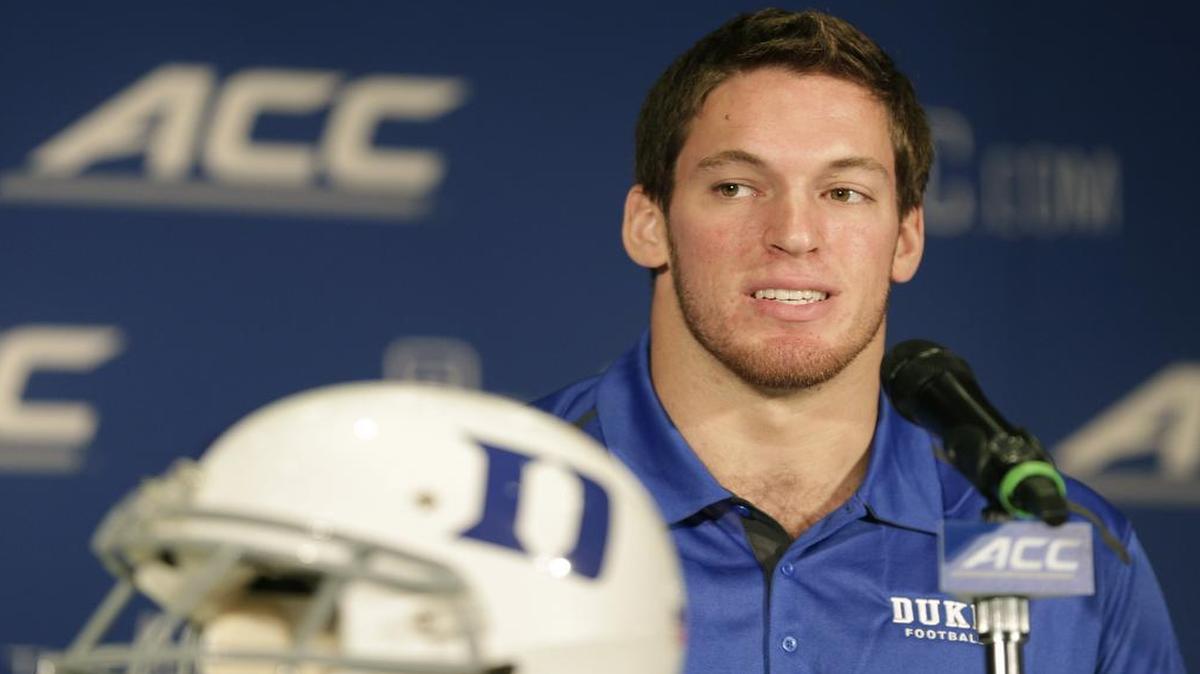 
Duke's Kelby Brown answers a question during a news conference at the Atlantic Coast Conference Football kickoff in Greensboro, N.C., Sunday, July 20, 2014. 
