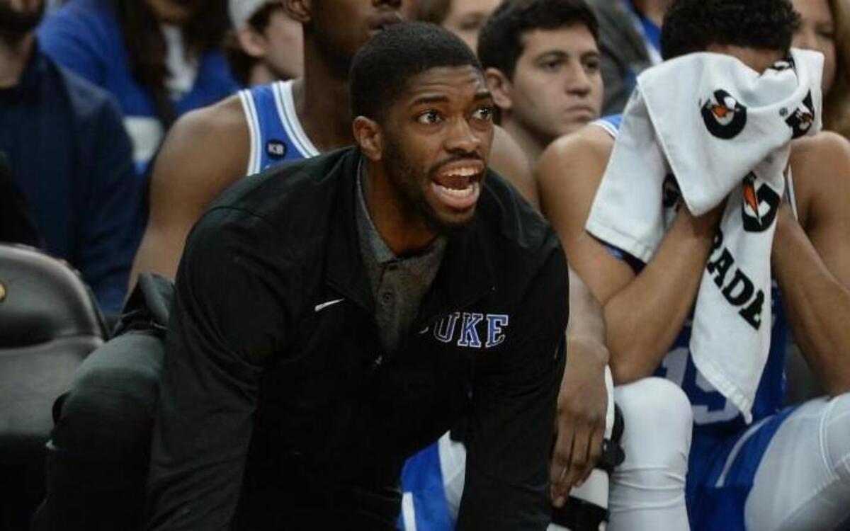 Injured co-captain Duke forward Amile Jefferson yells encouragement to the team during in the Blue Devils 78-69 loss at Louisville on Jan. 14.