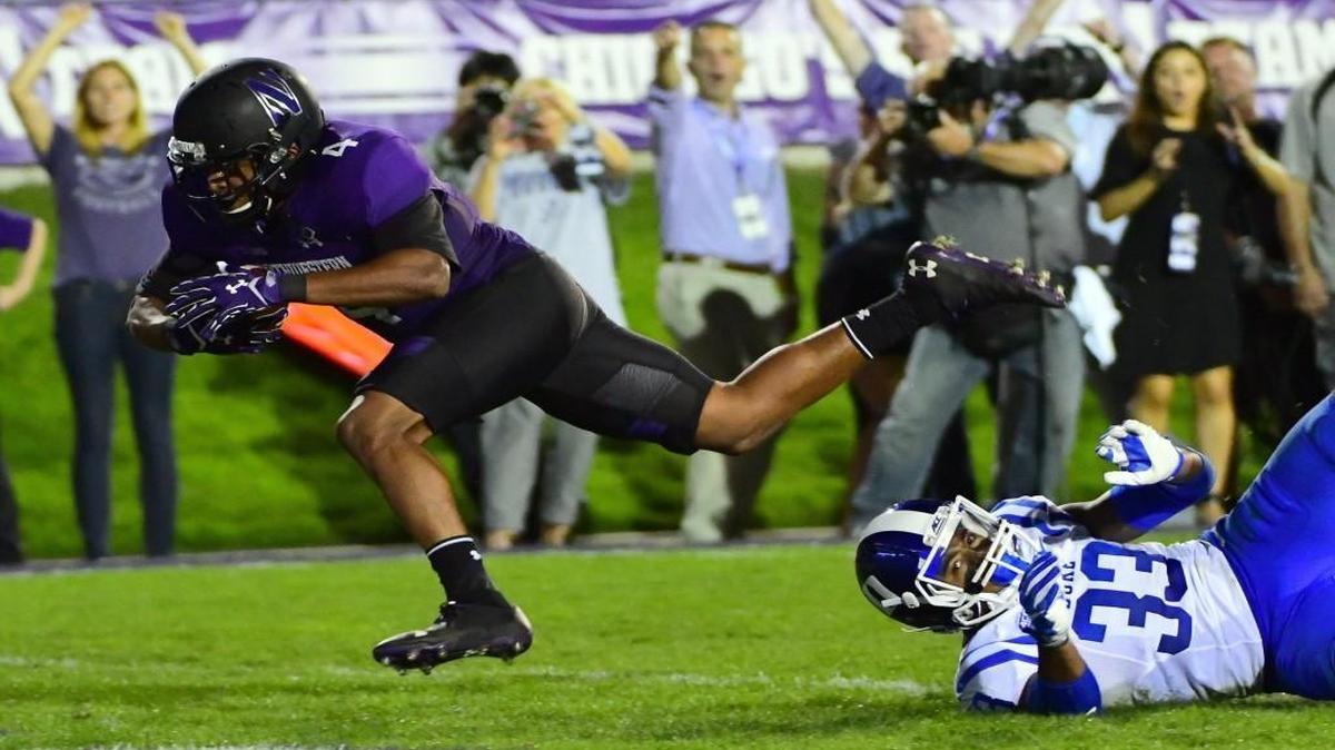 Solomon Vault of the Northwestern Wildcats scores a touchdown over Deondre Singleton of the Duke Blue Devils during the second half at Ryan Field in Evanston, Ill.