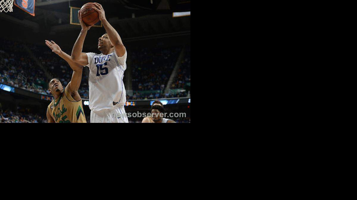
Duke center Jahlil Okafor (15) shoots a second half shot over Notre Dame forward Bonzie Colson (35).
