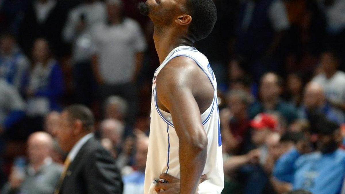 Duke co-captain Amile Jefferson looks at the scoreboard as he fouls out of the Blue Devils’ 88-81 loss to South Carolina in the NCAA tournament on March 19. It was Jefferson’s final game as a Duke player.