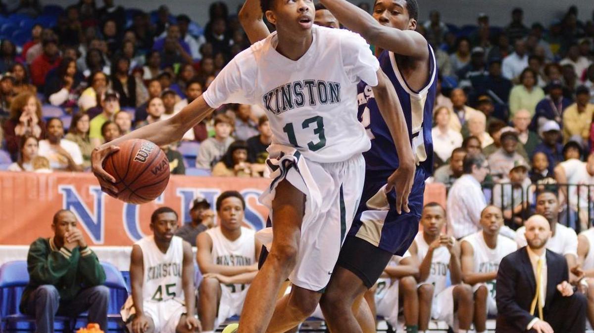 Kinston’s Brandon Ingram drives to the basket during a game against Jacksonville Northside in the men’s 2A NCHSAA Regional Finals on March 8, 2014. Ingram is one of only two N.C. High School Athletic Association basketball players to ever win four 2A state titles.