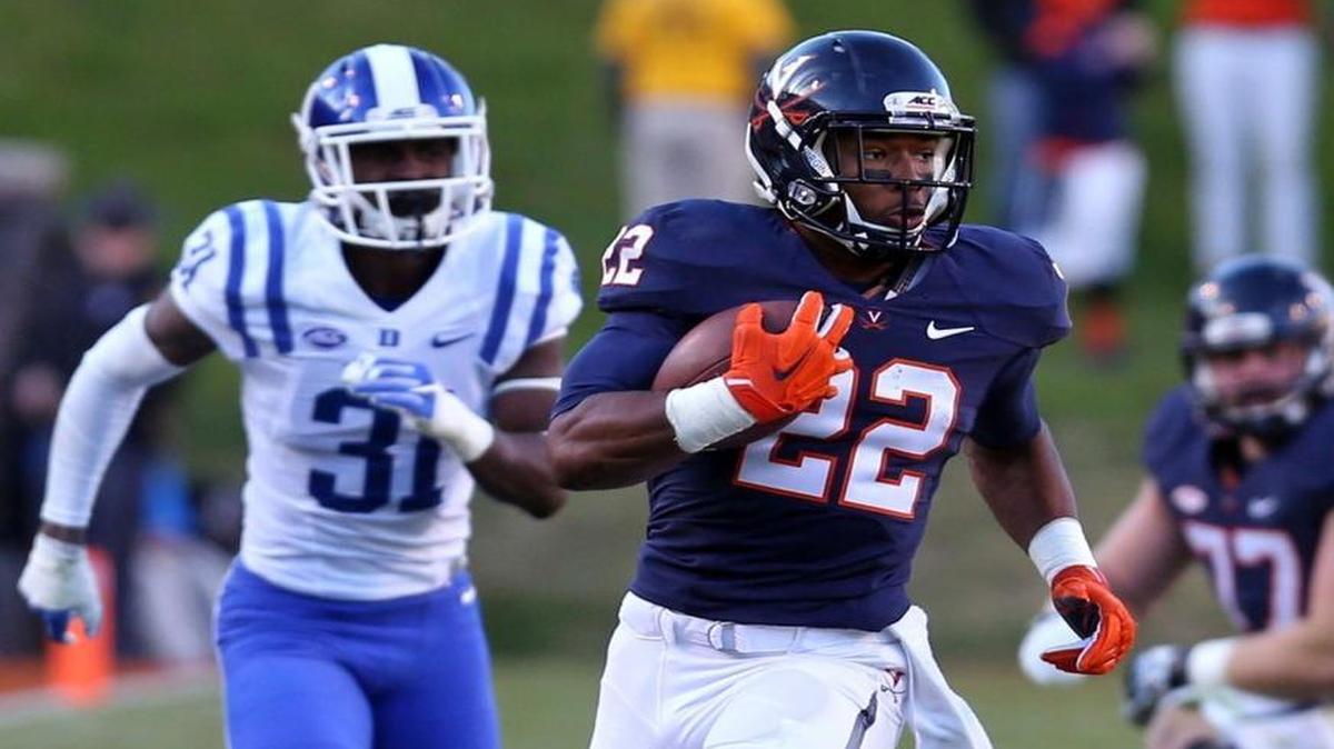 Virginia’s Daniel Hamm (22) runs in front of Duke cornerback Breon Borders (31) during the game in in Charlottesville, Va.