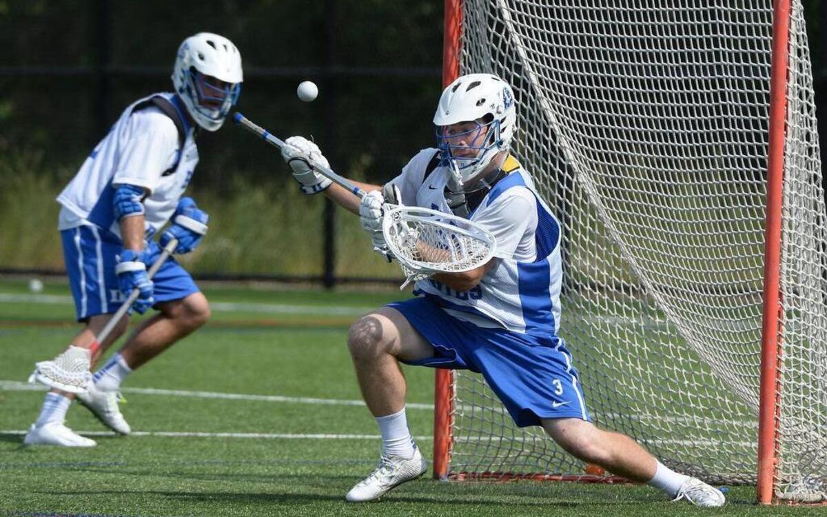 
Duke lacrosse team goalie Danny Fowler deflects a shot during practice on Wednesday, May 6, 2015 as the Blue Devils ready to defend their NCAA National Championship starting Saturday. The number five seeded Blue Devils will take on Ohio State in Durham at 7:30 pm. Fowler, a sophomore, was moved to the goalie position earlier this year and has been a main component of the Duke team's success.

