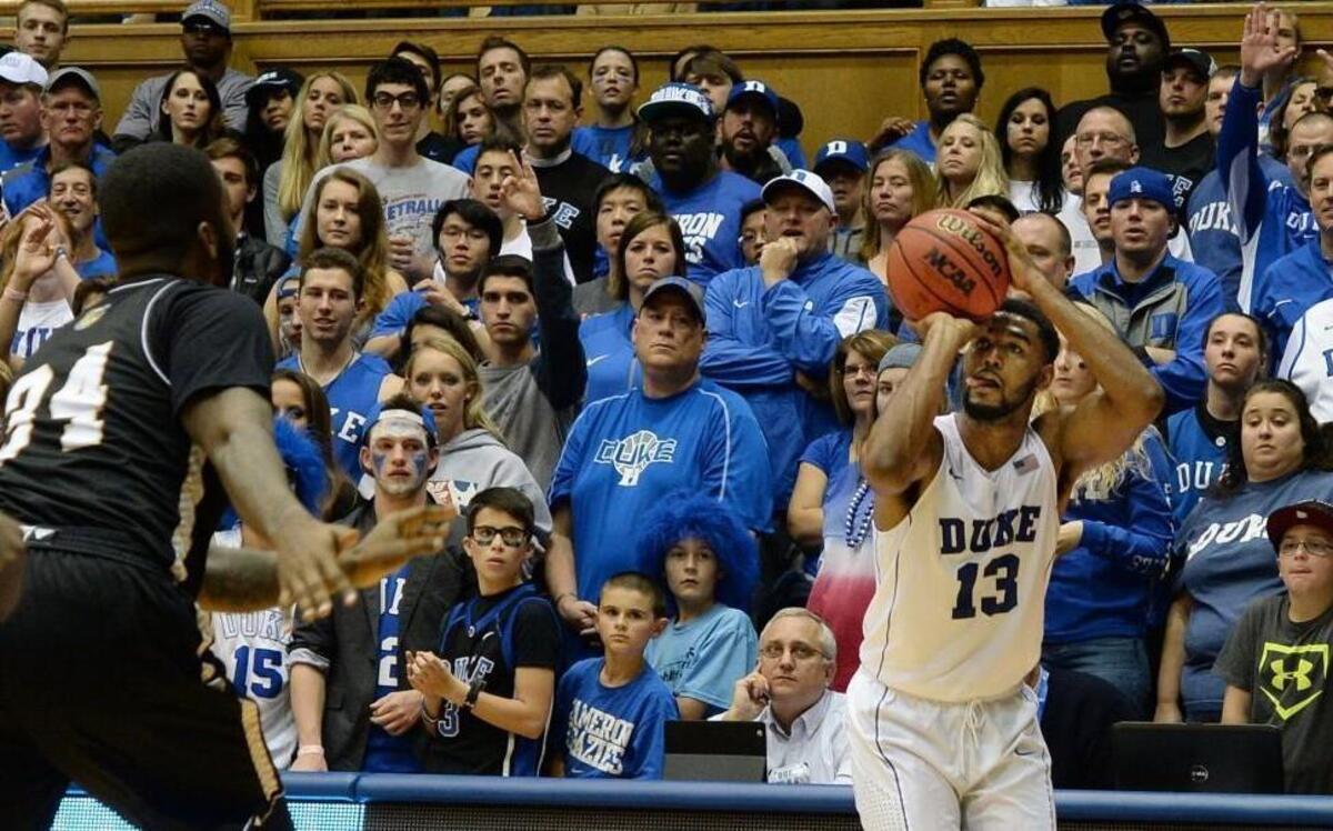 Duke guard Matt Jones goes up for one of his five first-half 3-pointers against Bryant at Cameron Indoor Stadium in Durham,.