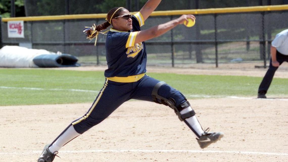 
Marissa Young pitches during her time at Michigan. As a pitcher at Michigan, she was a three-time All-American, the Big Ten pitcher of the year (2002) and player of the year (2003) in her final season. She left Michigan as the program’s all-time strikeout leader (927).
