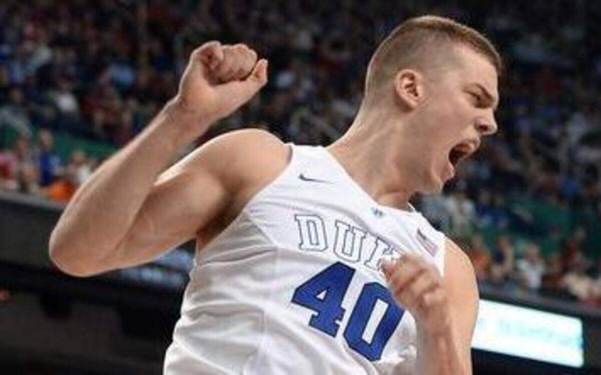 
Duke center Marshall Plumlee  reacts after one of his six dunks against N.C. State. Plumlee scored 12 points and was six for six, with three blocked shots against the Wolfpack. Duke defeated N.C. State 77-53 in the quarter-final round of the Atlantic Coast Conference basketball tournament at the Greensboro Coliseum in Greensboro, N.C. Thursday, March 12, 2015.
