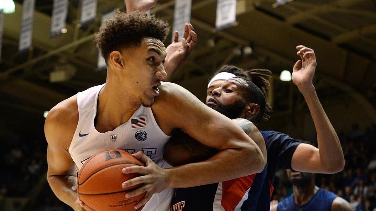 Duke forward Chase Jeter, left, moves inside against Virginia State’s Trey Brown in this Oct. 28, 2016 file photo. Jeter's next game was heading home to Las Vegas when the Blue Devils play at UNLV, the school where the sophomore’s father, Chris, played in the early 1990s.