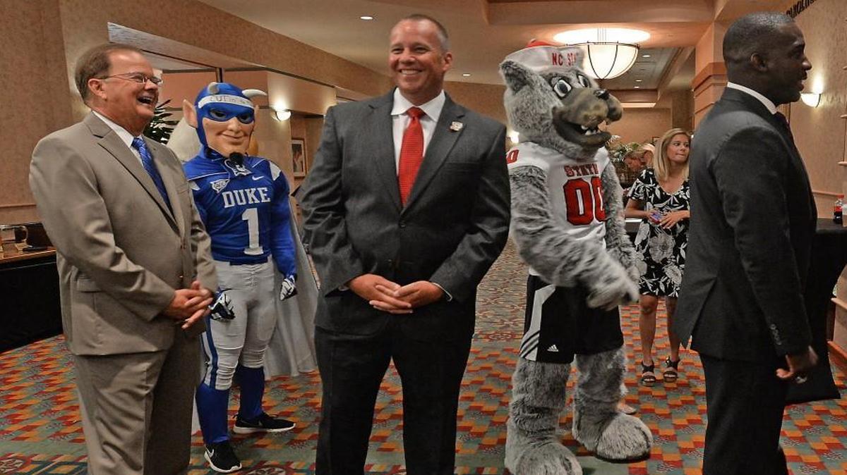 Coaches from the local Division 1 football programs spoke at the Bill Dooley Pigskin Preview in July. Waiting to be introduced are, left to right, Duke coach David Cutcliffe, N.C. State coach Dave Doeren and East Carolina coach Scottie Montgomery.