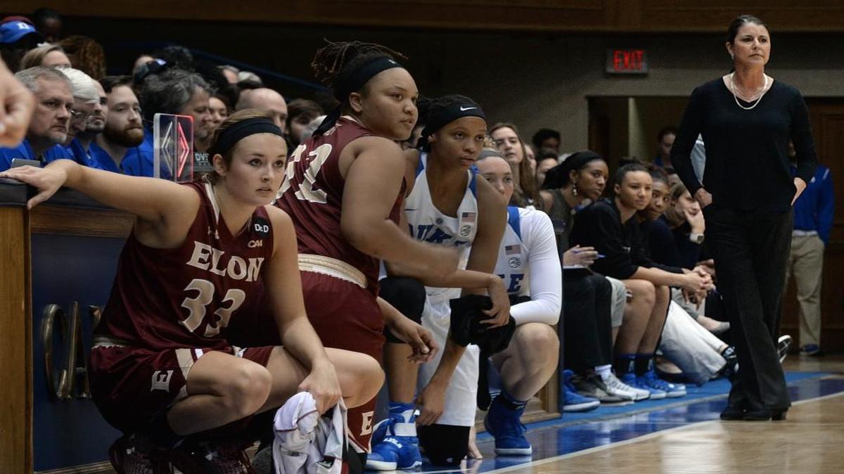 Elon player Maddie McCallie (33) readies to enter the game as her mother, Duke head coach Joanne P. McCallie, watches the action from the Duke bench at Cameron Indoor Stadium in Durham on Thursday, Dec. 8, 2016.