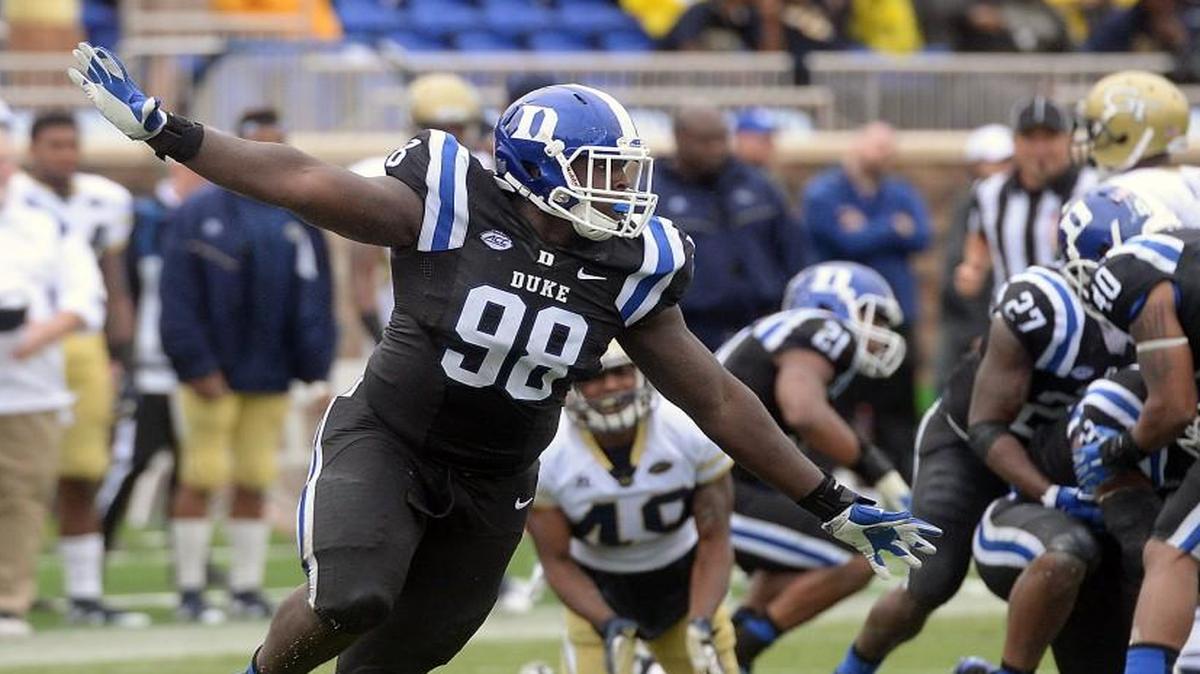 
Duke defensive tackle Carlos Wray (98) swoops towards the Duke bench after Georgia Tech fumbles the ball late in the fourth quarter. Defensively, Duke has played as well as any unit in the country. 
